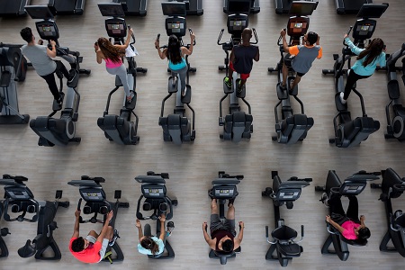 10 people on ellipticals.