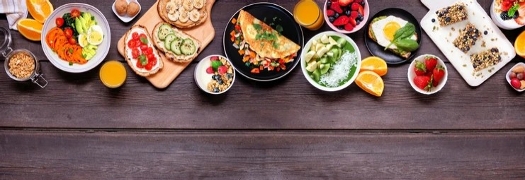 Image of fresh produce and foods on a wooden background.